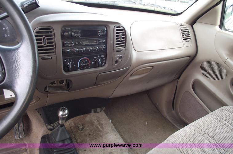 image for item C5673 1997 Ford F150 XLT super cab pickup truck