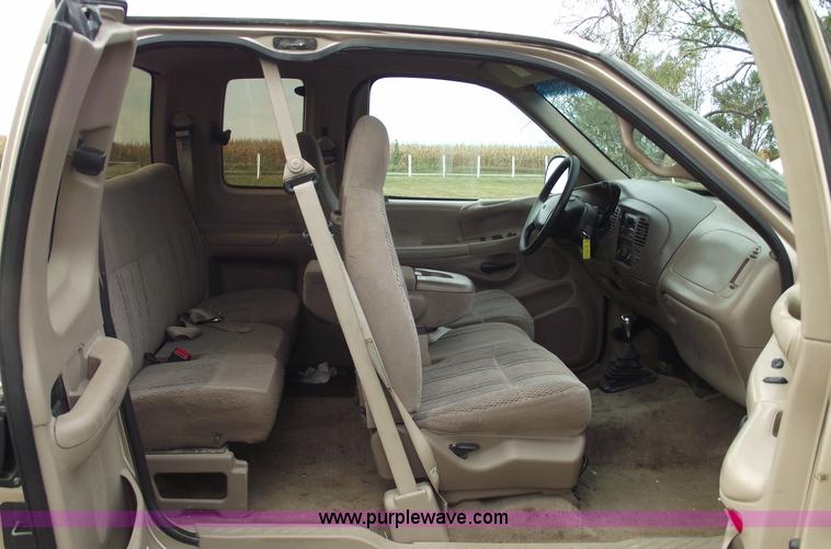 image for item C5673 1997 Ford F150 XLT super cab pickup truck