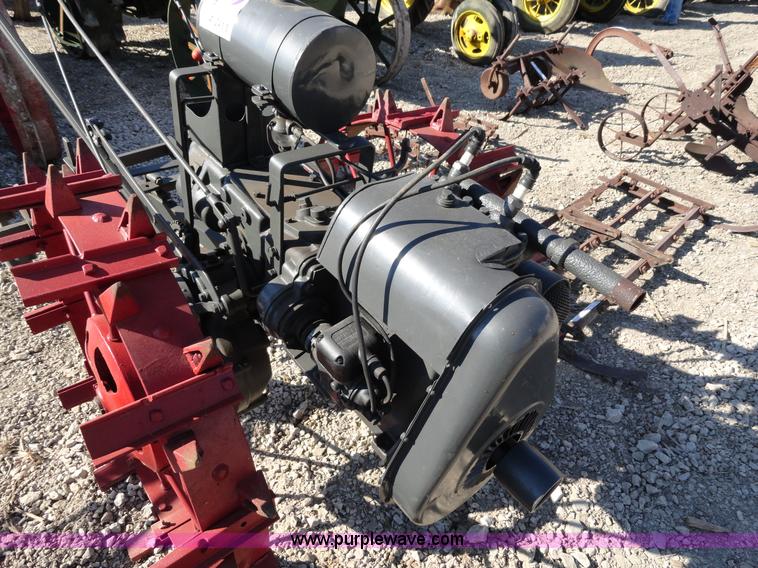 image for item A2411 Viking garden tractor with cultivator