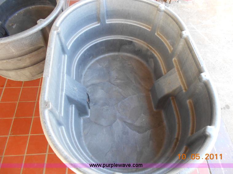 image for item D9070 (2) Rubbermaid 150 gallon stock tanks