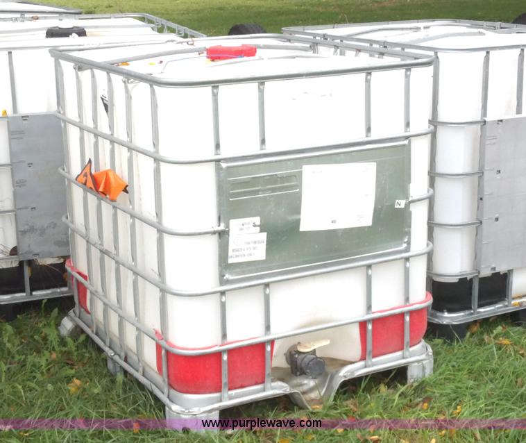 image for item F9880 (4) 330 gallon poly chemical tanks