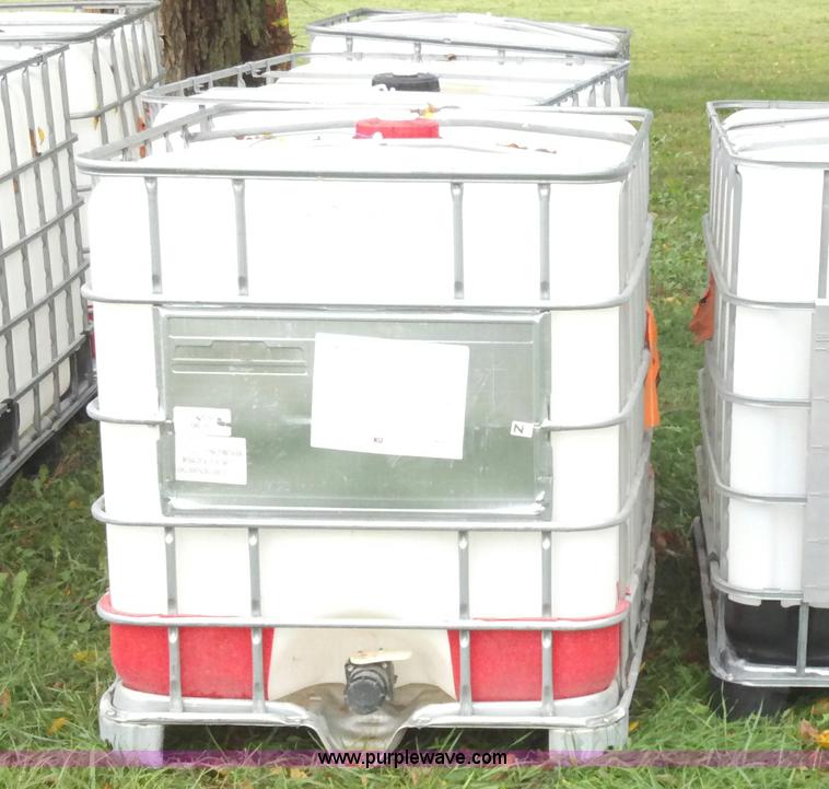 image for item F9880 (4) 330 gallon poly chemical tanks