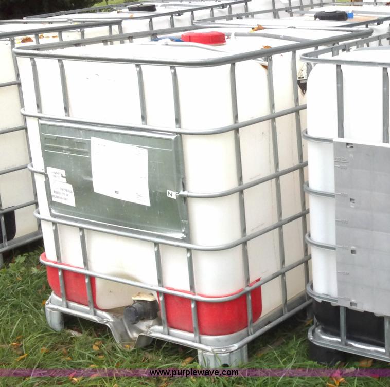 image for item F9880 (4) 330 gallon poly chemical tanks