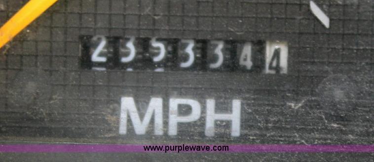 image for item A3191 1995 Ford F700 flatbed dump truck