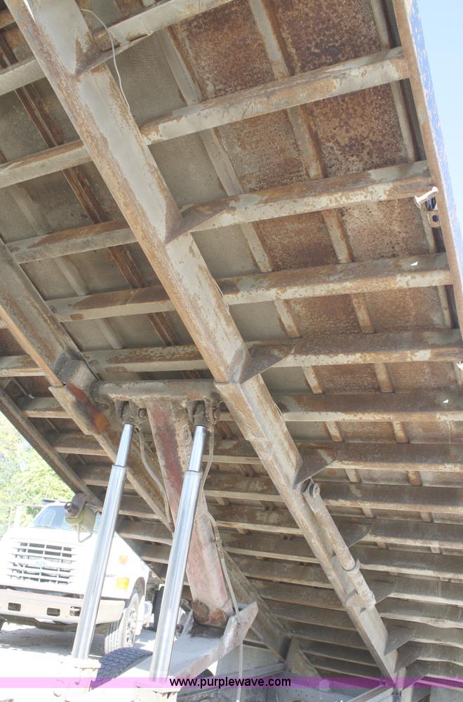 image for item A3191 1995 Ford F700 flatbed dump truck