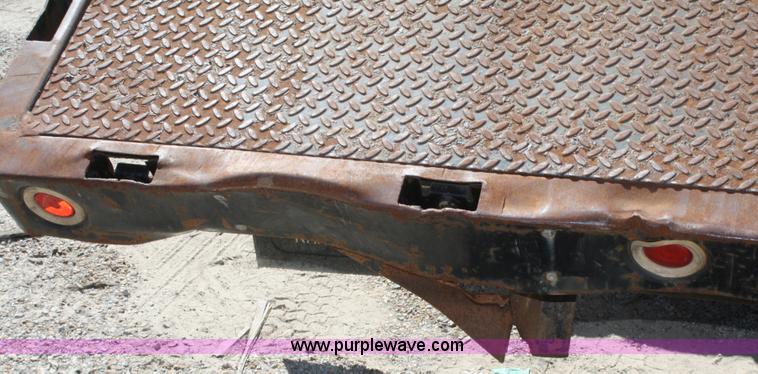 image for item A3191 1995 Ford F700 flatbed dump truck