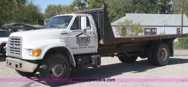 image for item A3216 1996 Ford F700 flatbed truck