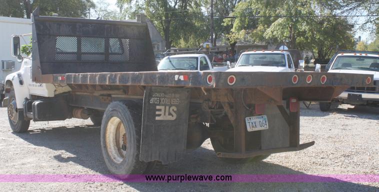 image for item A3216 1996 Ford F700 flatbed truck