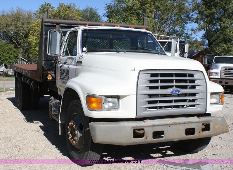 image for item A3216 1996 Ford F700 flatbed truck