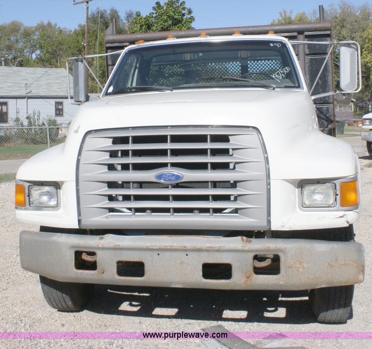 image for item A3216 1996 Ford F700 flatbed truck