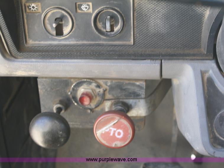 image for item A3216 1996 Ford F700 flatbed truck