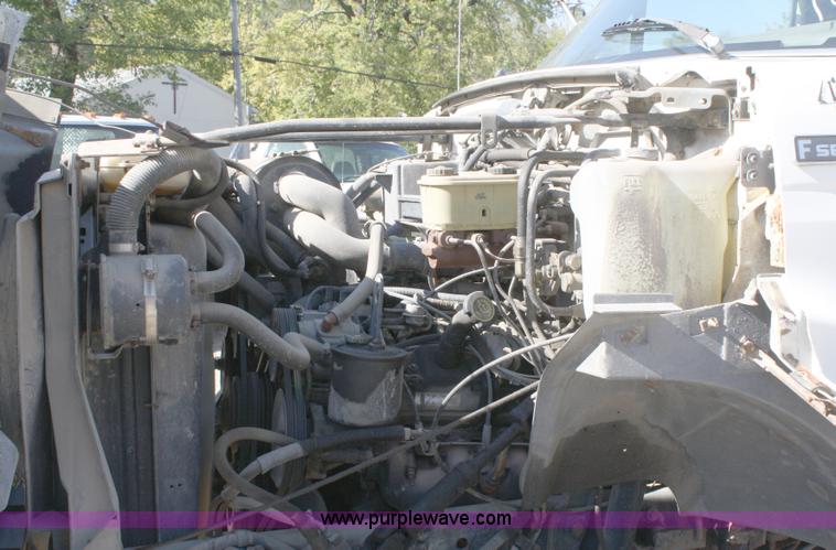 image for item A3216 1996 Ford F700 flatbed truck