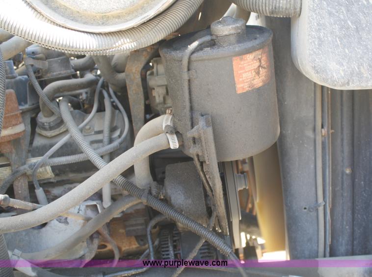 image for item A3216 1996 Ford F700 flatbed truck