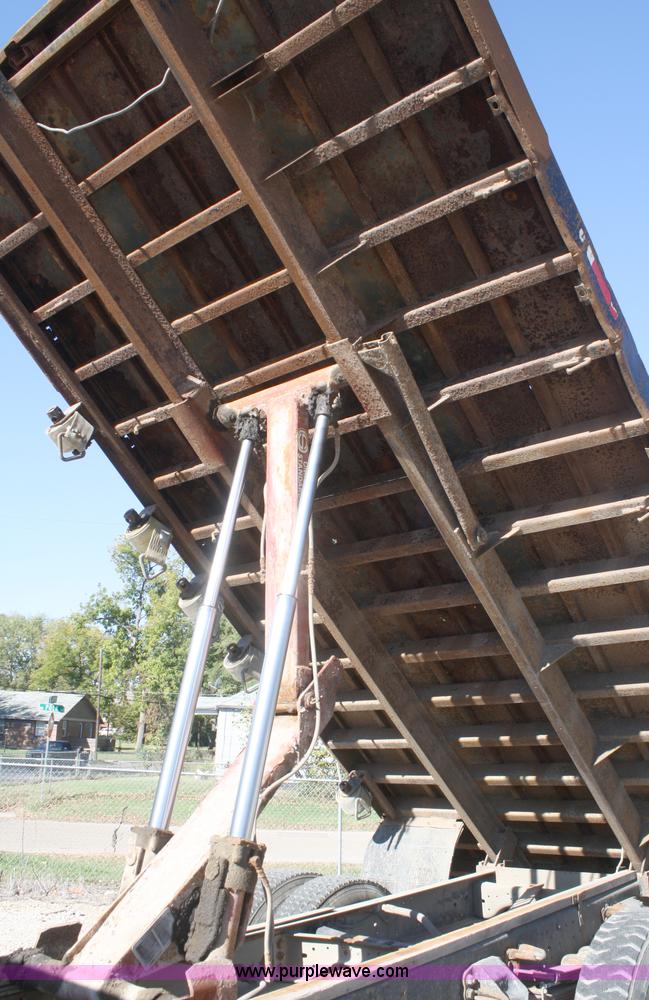 image for item A3216 1996 Ford F700 flatbed truck