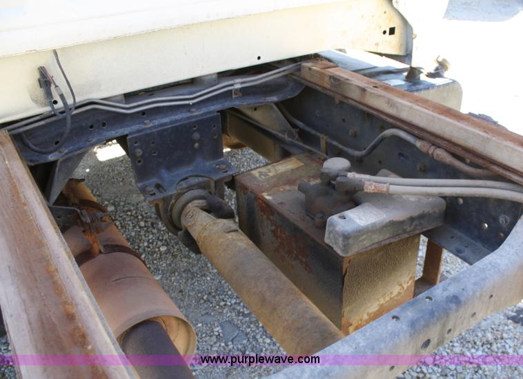 image for item A3216 1996 Ford F700 flatbed truck