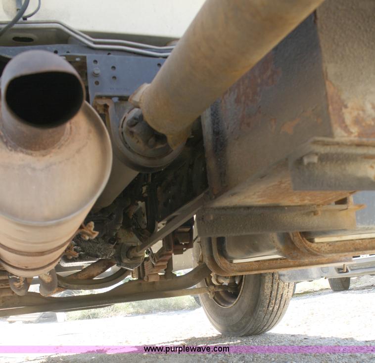 image for item A3216 1996 Ford F700 flatbed truck