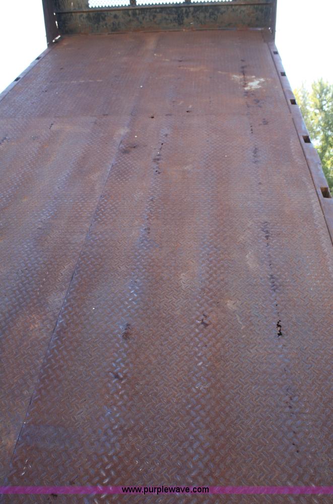 image for item A3216 1996 Ford F700 flatbed truck