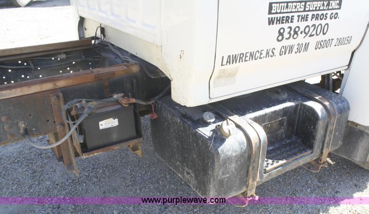 image for item A3216 1996 Ford F700 flatbed truck