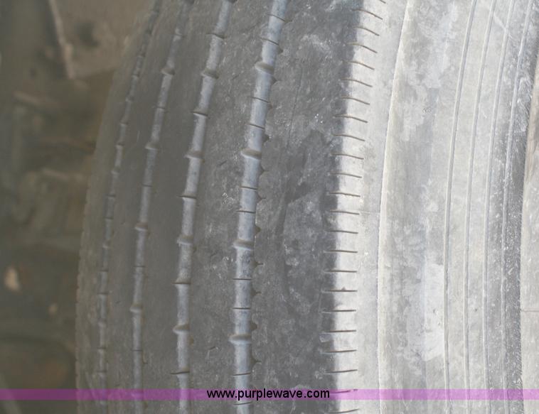 image for item A3216 1996 Ford F700 flatbed truck