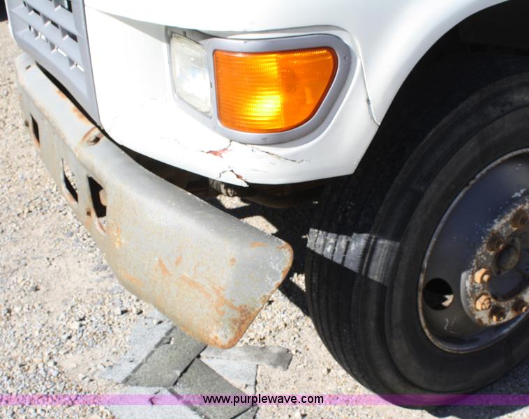 image for item A3216 1996 Ford F700 flatbed truck