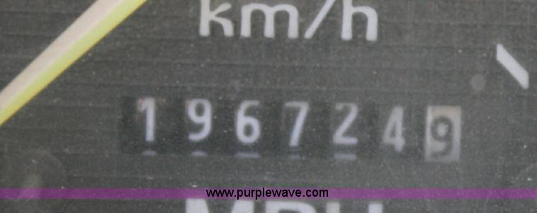 image for item A3217 1995 Ford F700 flatbed truck