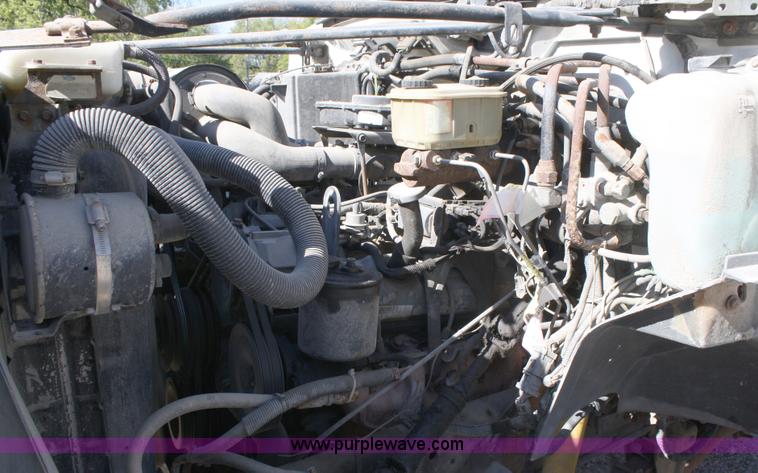 image for item A3217 1995 Ford F700 flatbed truck