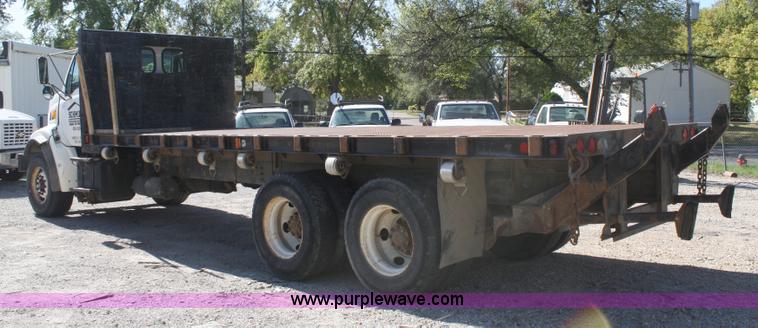 image for item A3218 1998 Ford Louisville LT8501 flatbed truck