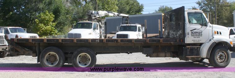 image for item A3218 1998 Ford Louisville LT8501 flatbed truck