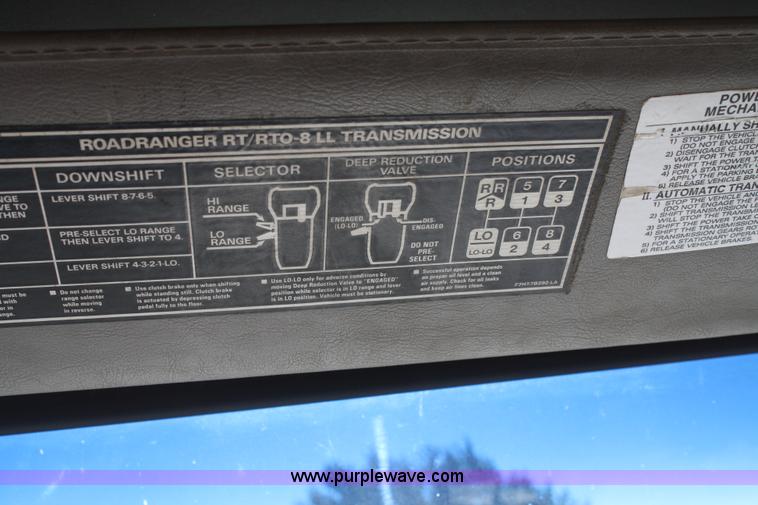 image for item A3218 1998 Ford Louisville LT8501 flatbed truck