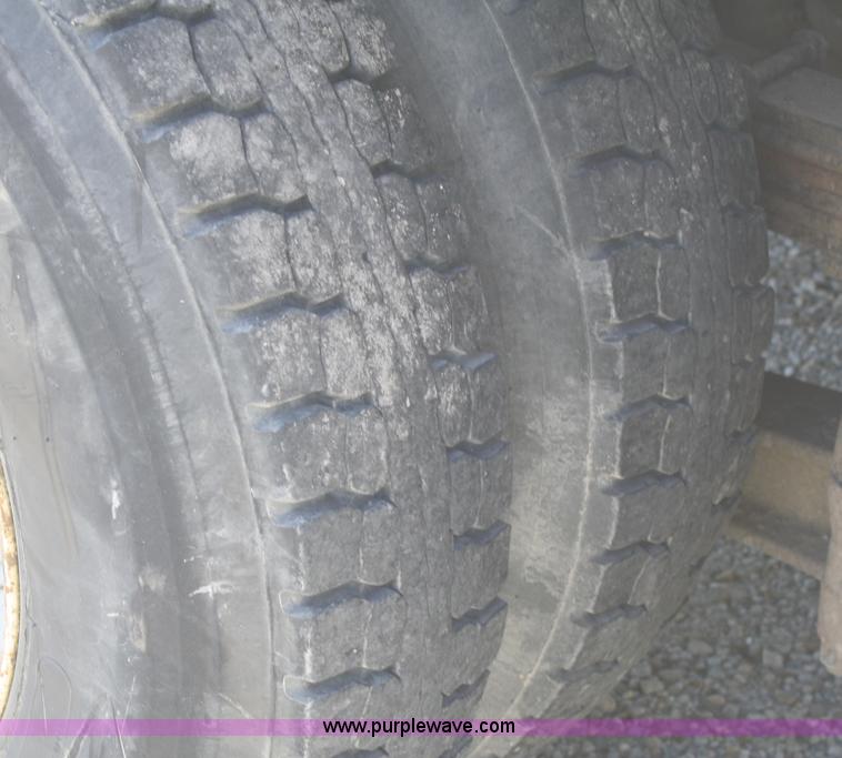 image for item A3218 1998 Ford Louisville LT8501 flatbed truck