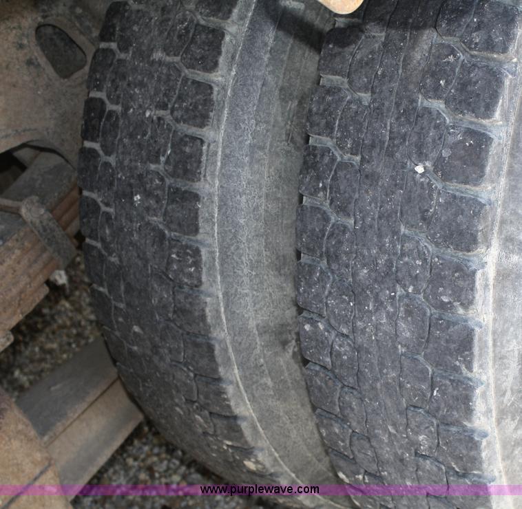 image for item A3218 1998 Ford Louisville LT8501 flatbed truck