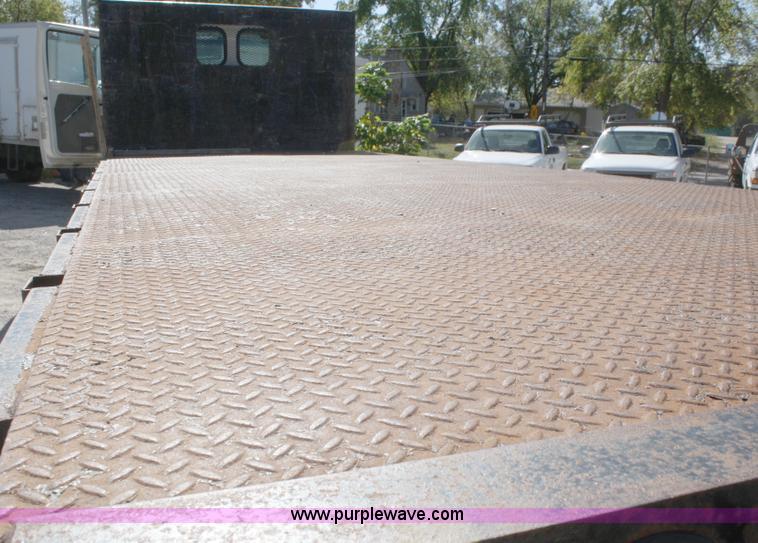 image for item A3218 1998 Ford Louisville LT8501 flatbed truck