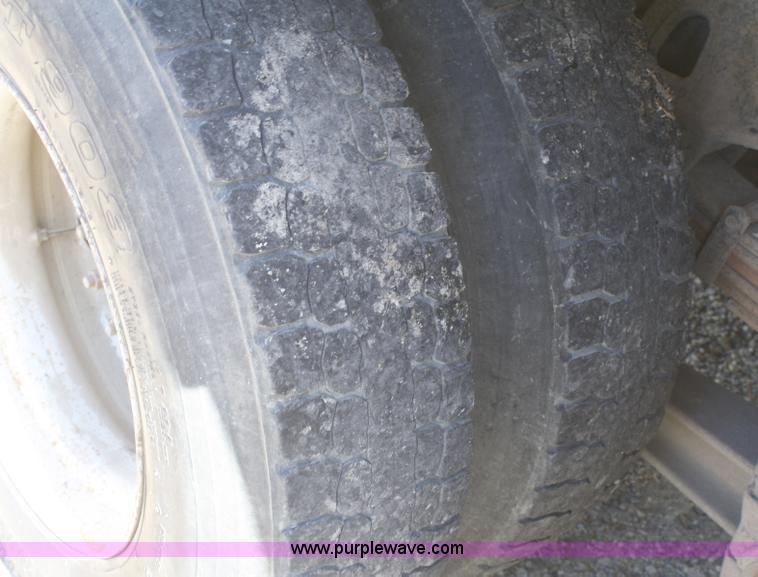 image for item A3218 1998 Ford Louisville LT8501 flatbed truck