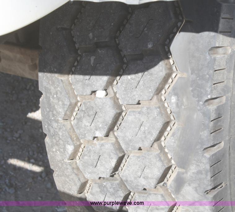 image for item A3218 1998 Ford Louisville LT8501 flatbed truck