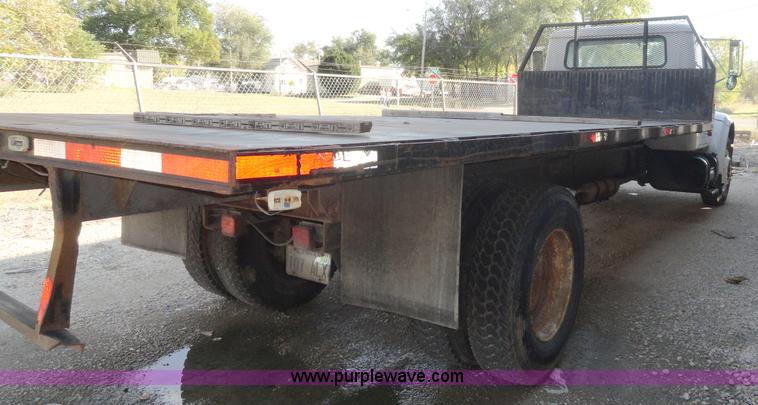 image for item A3226 1999 International 4700 flatbed truck