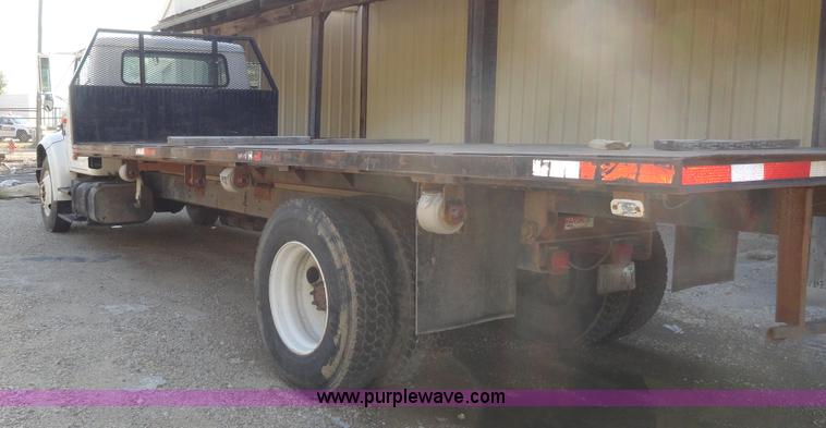 image for item A3226 1999 International 4700 flatbed truck
