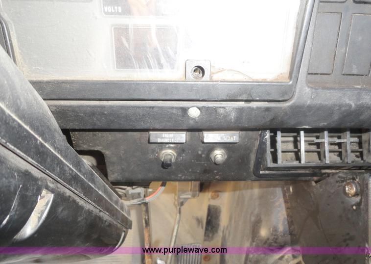 image for item A3226 1999 International 4700 flatbed truck