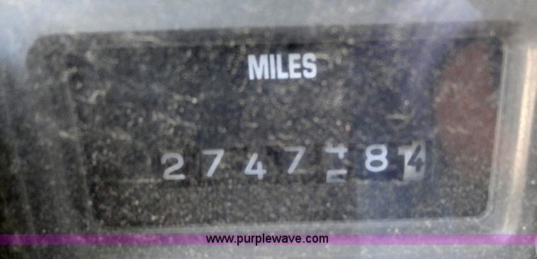 image for item A3226 1999 International 4700 flatbed truck