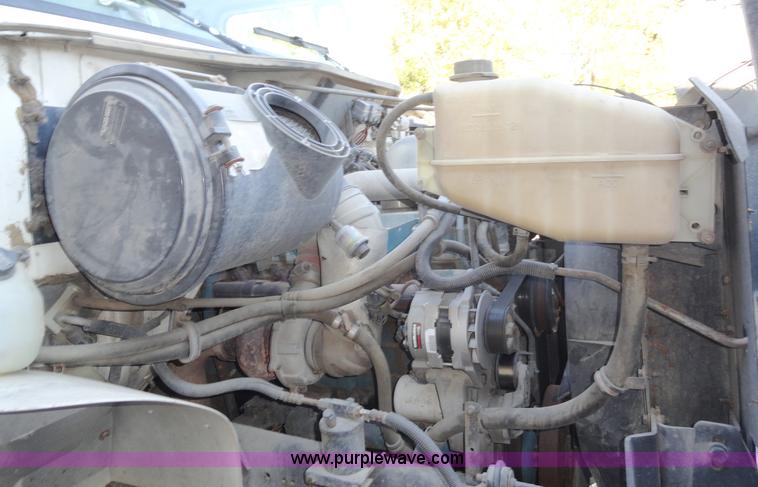 image for item A3226 1999 International 4700 flatbed truck