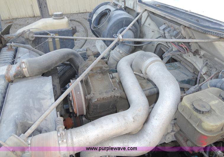 image for item A3226 1999 International 4700 flatbed truck