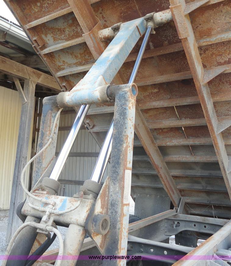 image for item A3226 1999 International 4700 flatbed truck