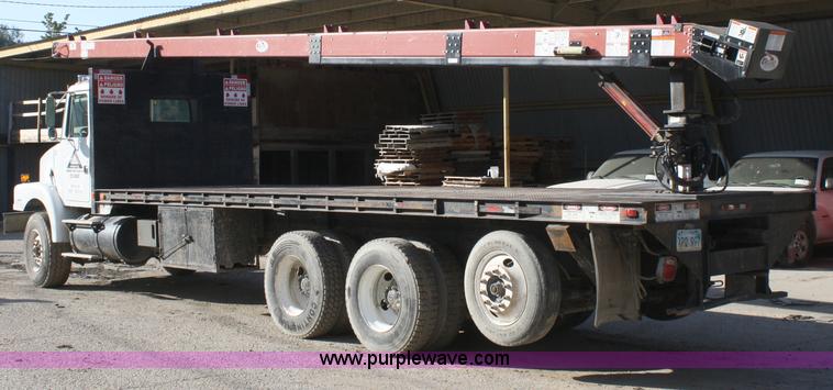 image for item A3228 2001 Volvo WG conveyor truck