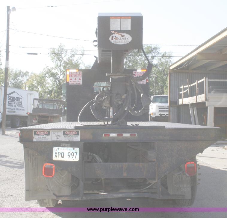 image for item A3228 2001 Volvo WG conveyor truck