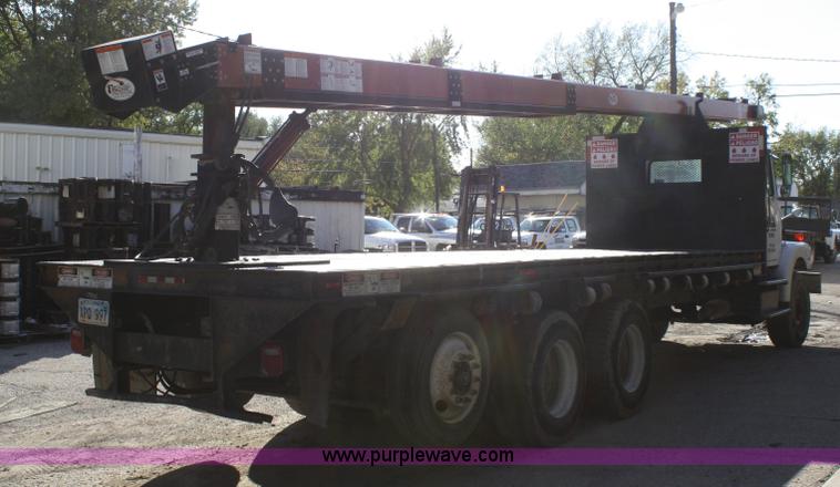 image for item A3228 2001 Volvo WG conveyor truck