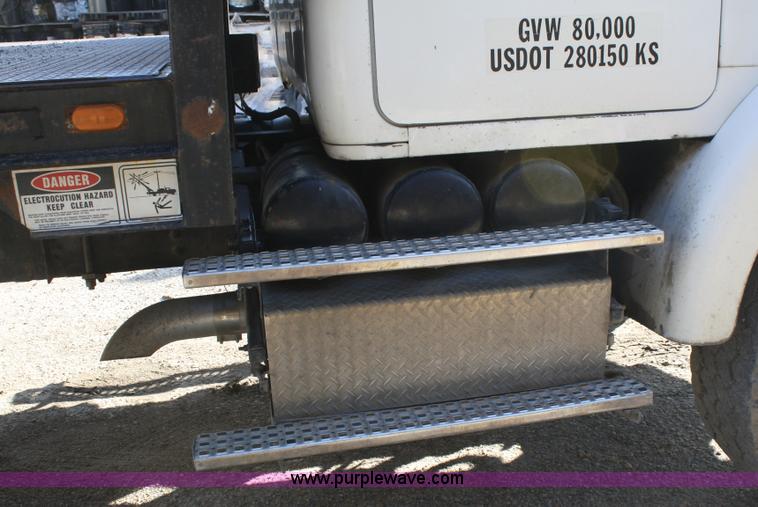 image for item A3228 2001 Volvo WG conveyor truck