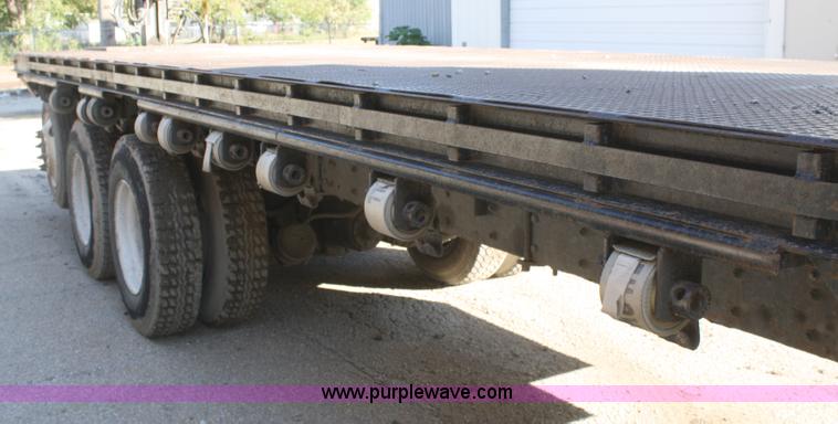 image for item A3228 2001 Volvo WG conveyor truck