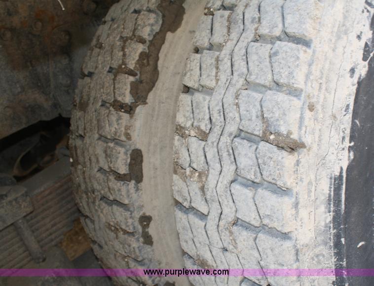 image for item A3228 2001 Volvo WG conveyor truck