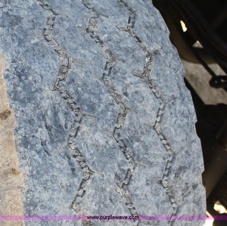 image for item A3228 2001 Volvo WG conveyor truck