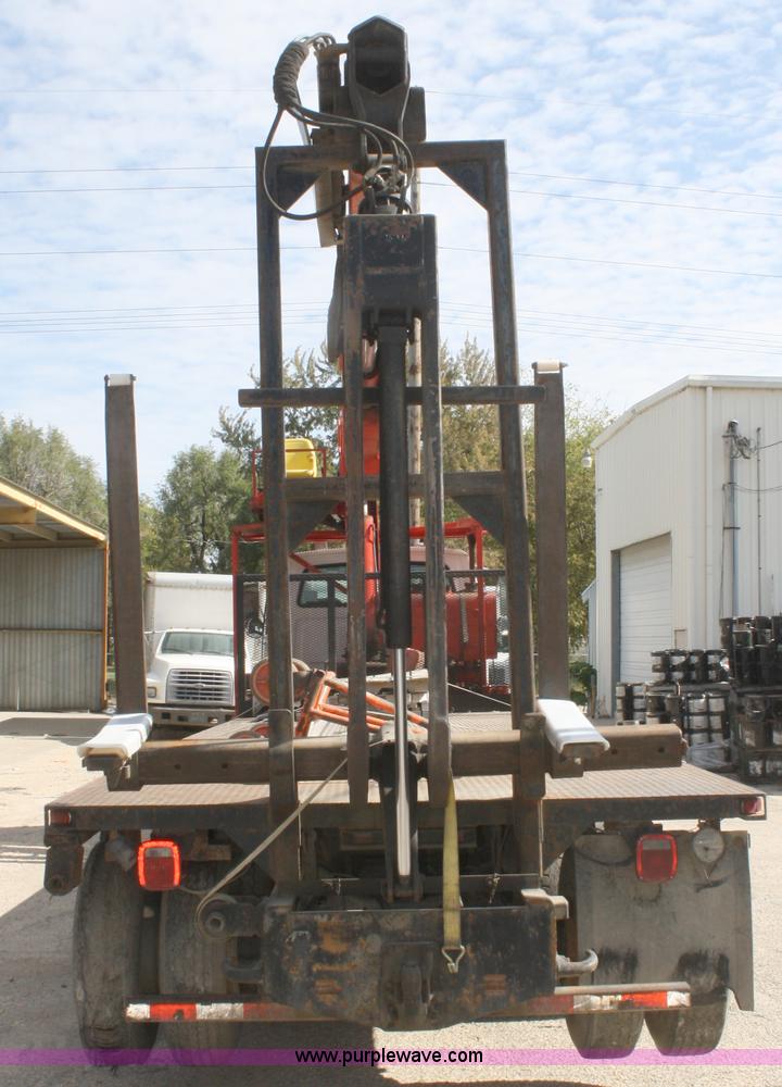 image for item A3236 1998 Ford Louisville LT9513 boom truck