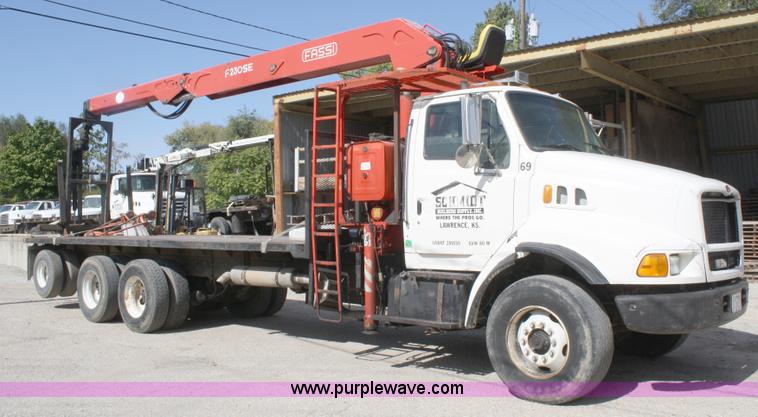 image for item A3236 1998 Ford Louisville LT9513 boom truck